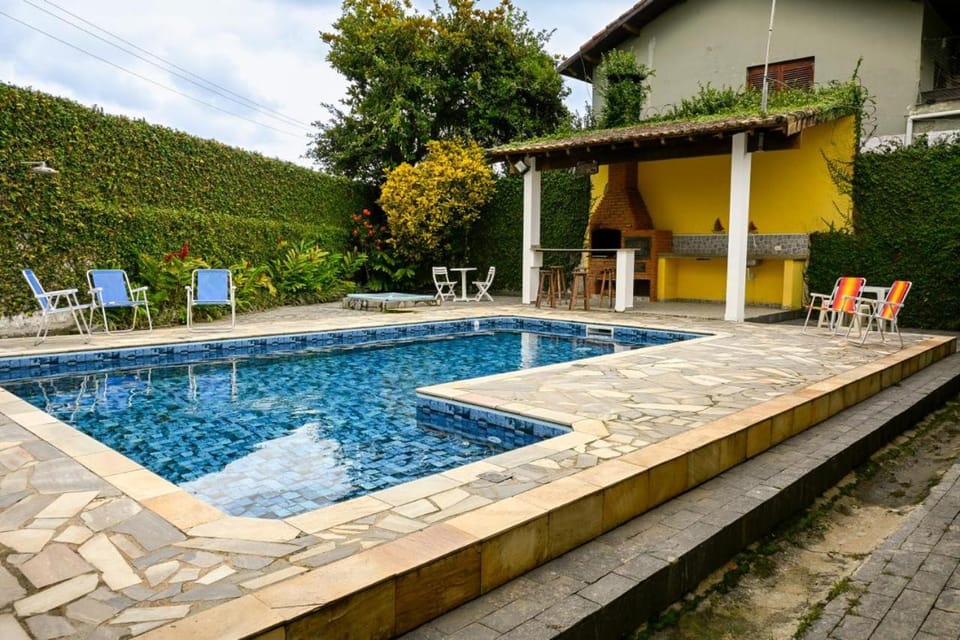 Pé na Areia com Piscina e Churrasqueira - 2 suítes House in Bertioga