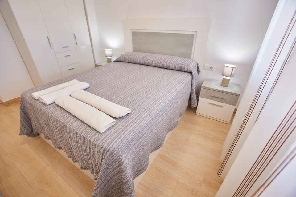 Bed, wardrobe