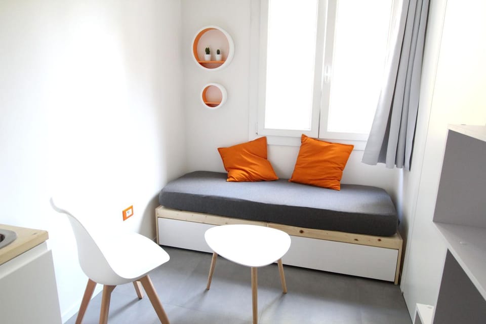 Bed, Living room, Seating area