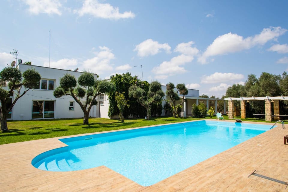 Property building, Day, Natural landscape, Garden, Pool view, Swimming pool
