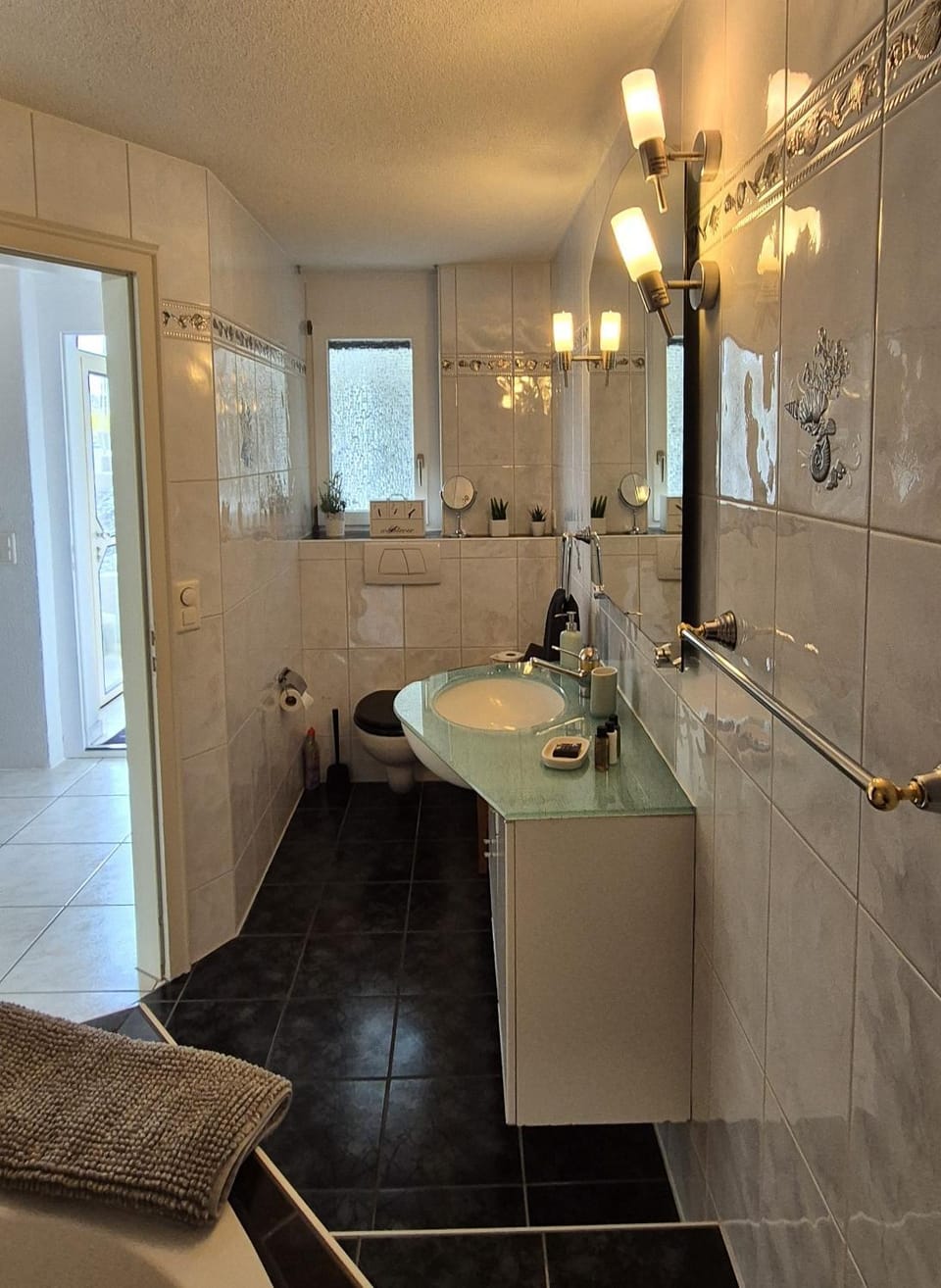 Bathroom, hair dryier, towels