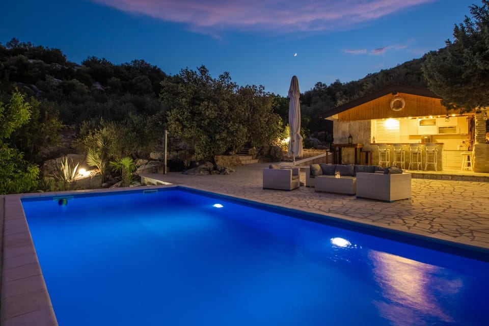 Property building, Night, Pool view, Swimming pool, sunbed