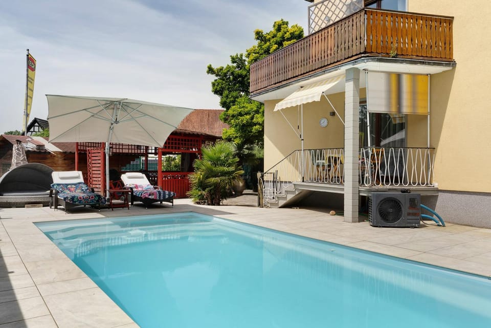 Property building, Living room, Swimming pool