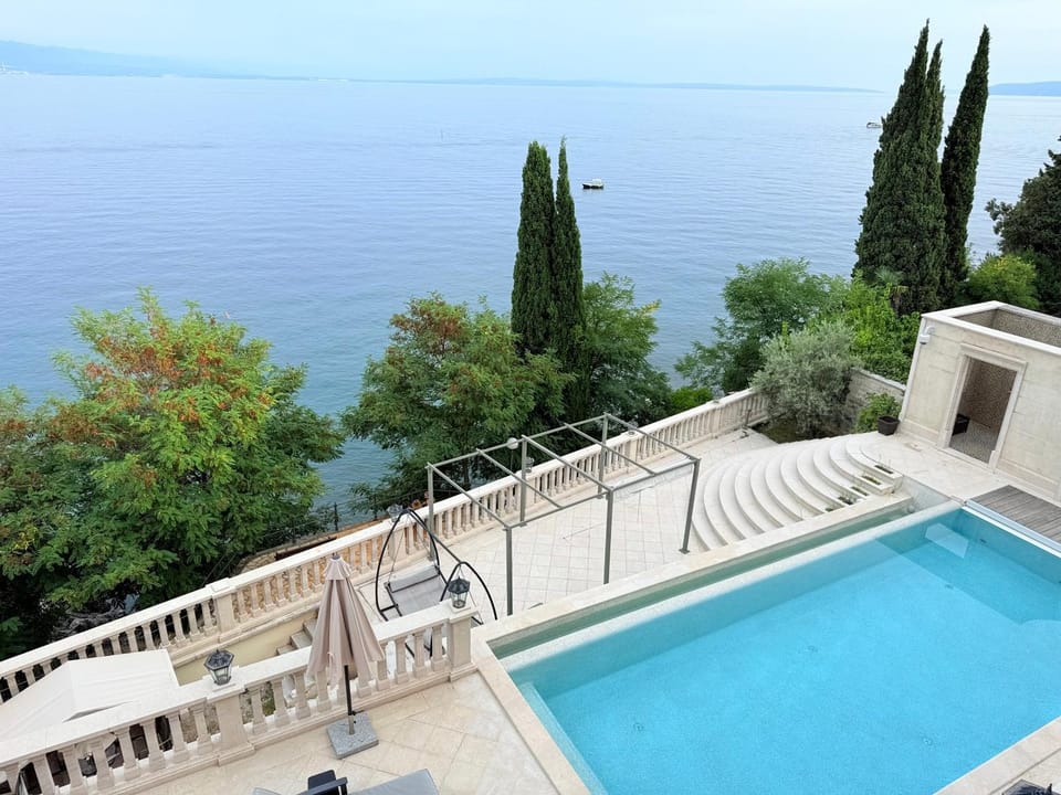 Property building, Patio, Natural landscape, View (from property/room), Balcony/Terrace, Pool view, Sea view, Swimming pool, sunbed