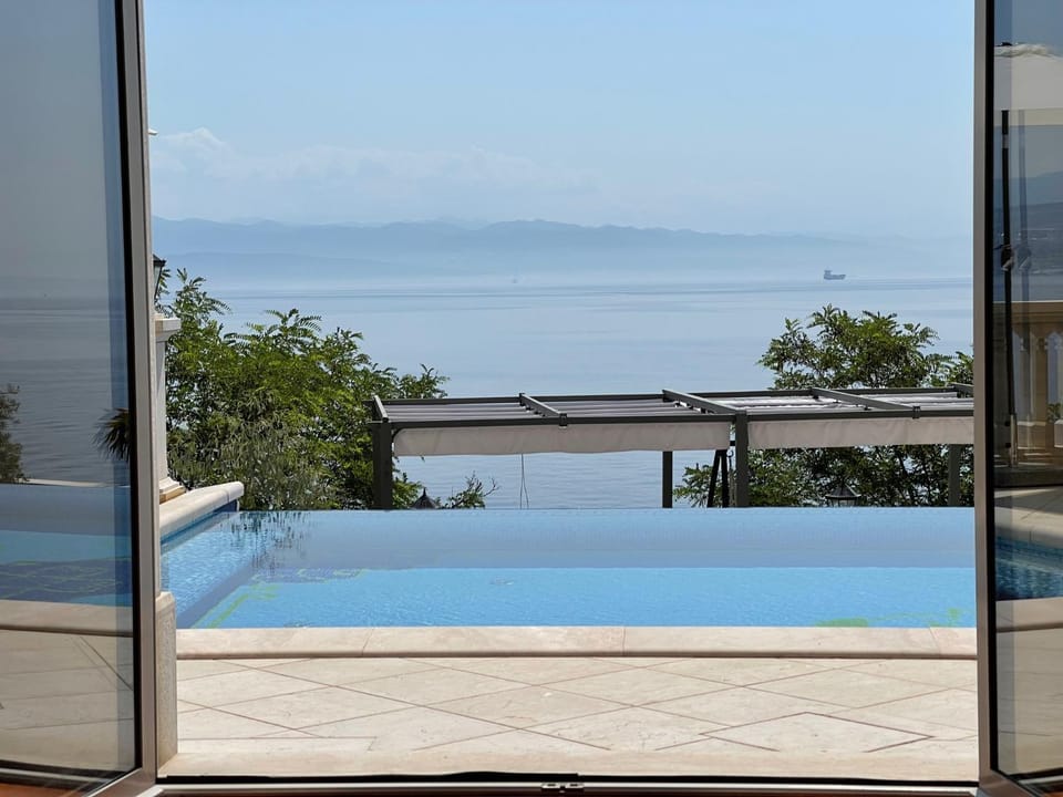 Patio, Day, Natural landscape, Balcony/Terrace, Sea view, Swimming pool
