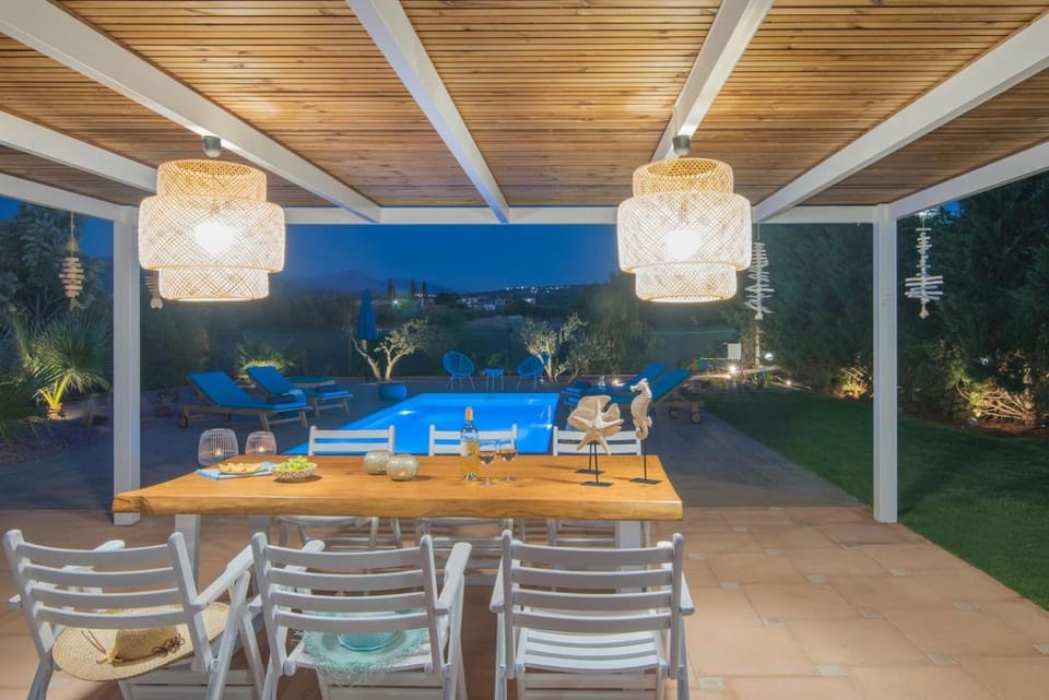 Patio, Seating area, Dining area, Garden view, Pool view, Swimming pool