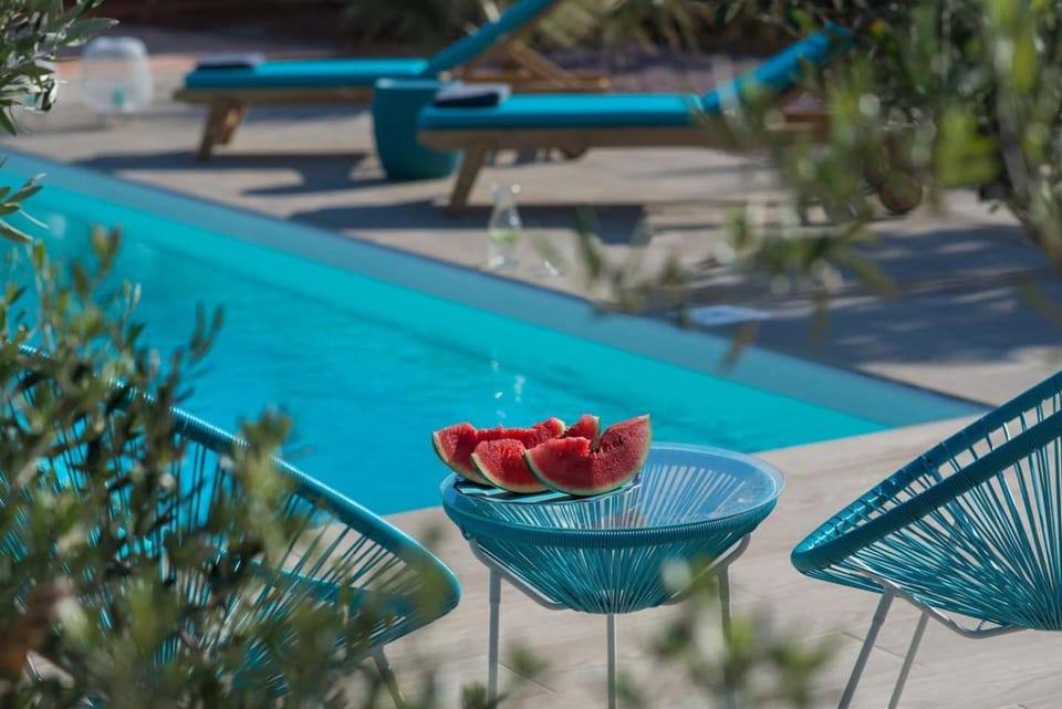 Patio, Day, Garden, Pool view, Swimming pool, sunbed