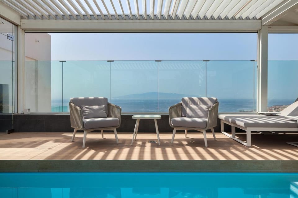 Patio, Day, Natural landscape, View (from property/room), Balcony/Terrace, Living room, Seating area, Pool view, Sea view, Swimming pool, sunbed