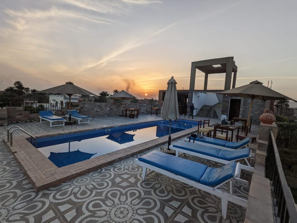 Day, Pool view, Swimming pool, Sunset, sunbed
