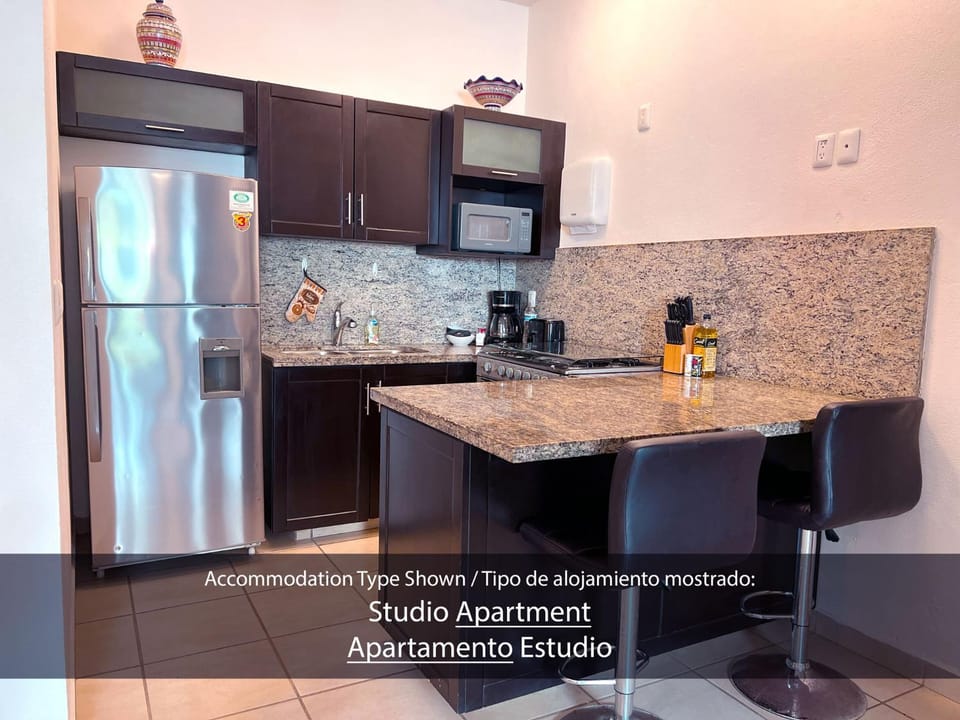 Kitchen or kitchenette, Dining area, Text overlay, minibar, pet friendly, stove