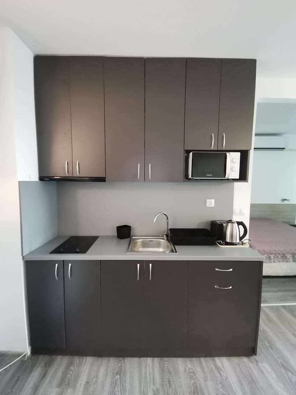 Kitchen or kitchenette, stove