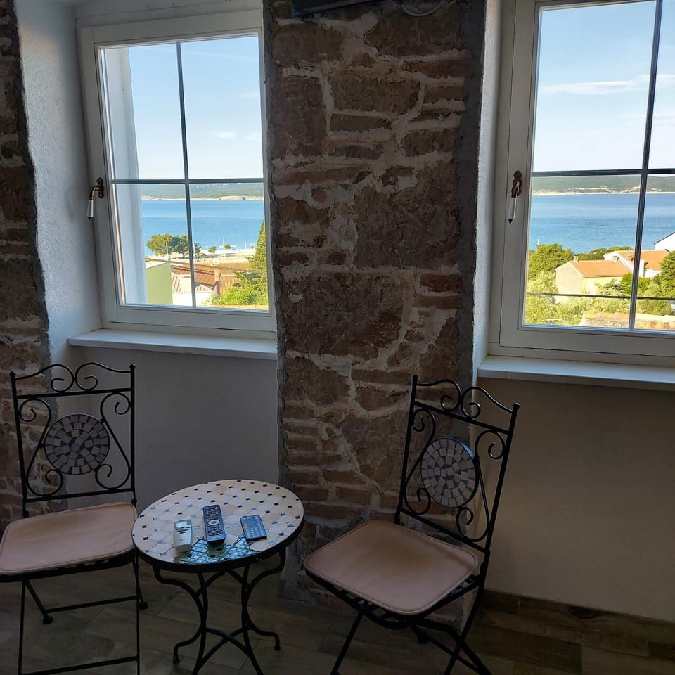View (from property/room), Seating area, Bedroom, Sea view