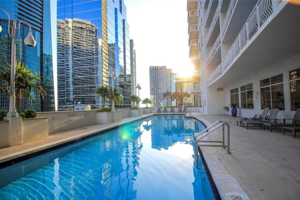 Property building, Pool view, Swimming pool, Sunset, sunbed