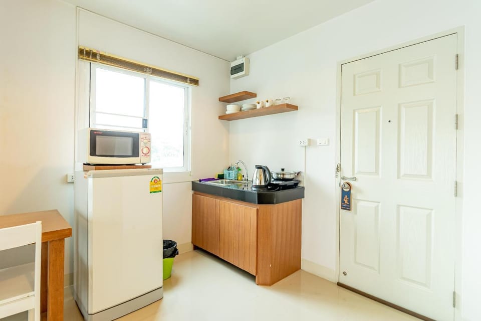 Kitchen or kitchenette, stove