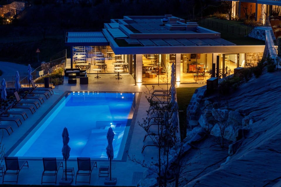 Property building, Restaurant/places to eat, Night, Pool view, Swimming pool