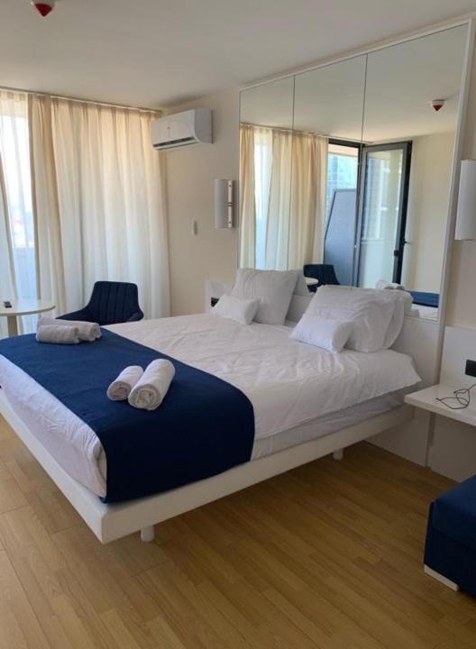Bed, Photo of the whole room, Bedroom, towels, air conditioner