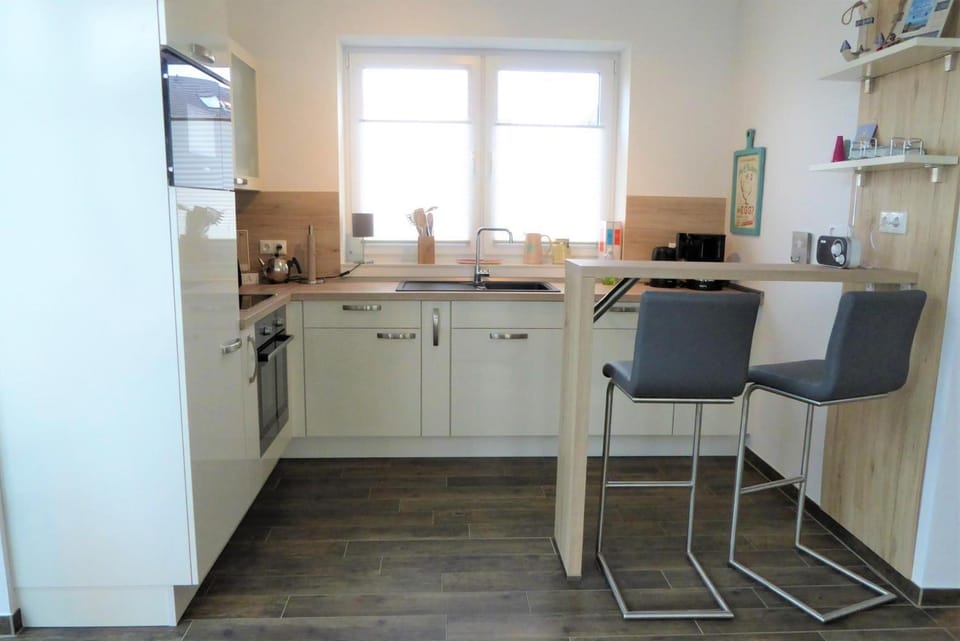 Haus Fehnhuus, Am Alten Deich 11a House in Friesland