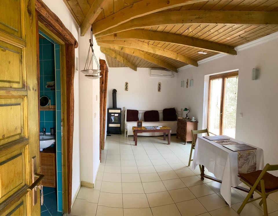 Property building, Living room, Dining area, fireplace, fireplace, air conditioner