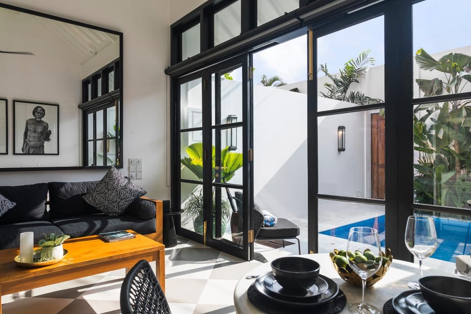 Living room, Seating area, Garden view, Pool view