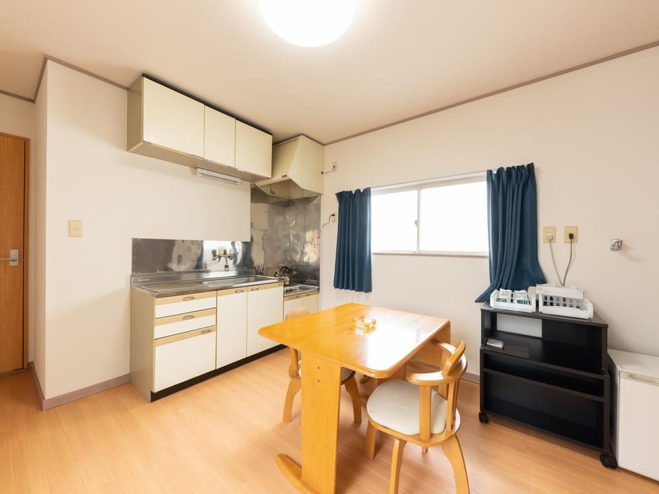 Kitchen or kitchenette, Living room, Photo of the whole room, Seating area, Dining area, stove