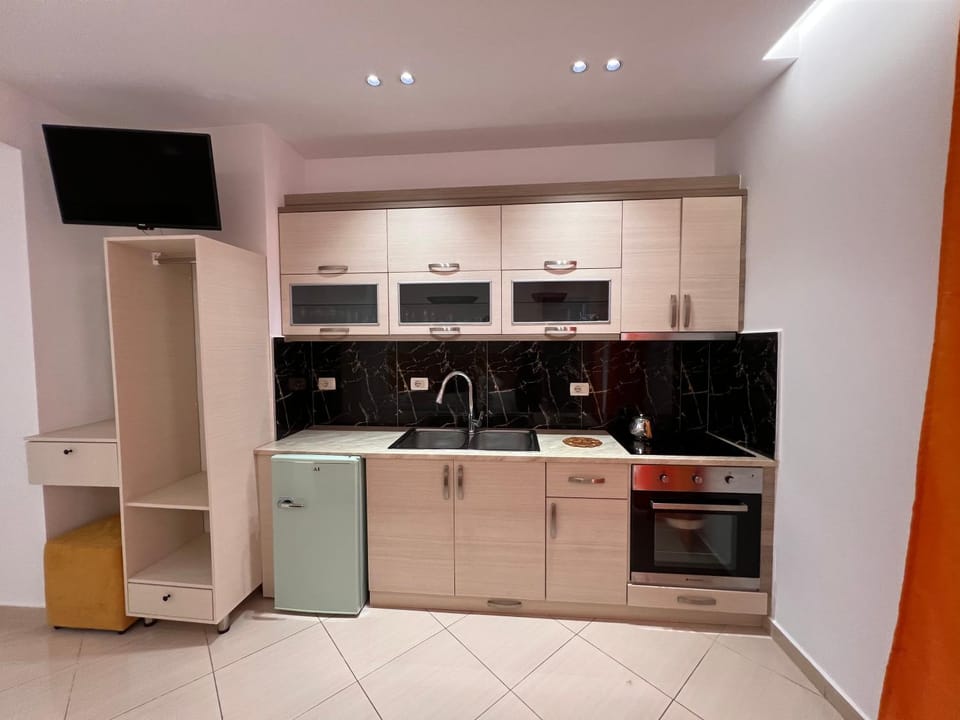 Kitchen or kitchenette, oven