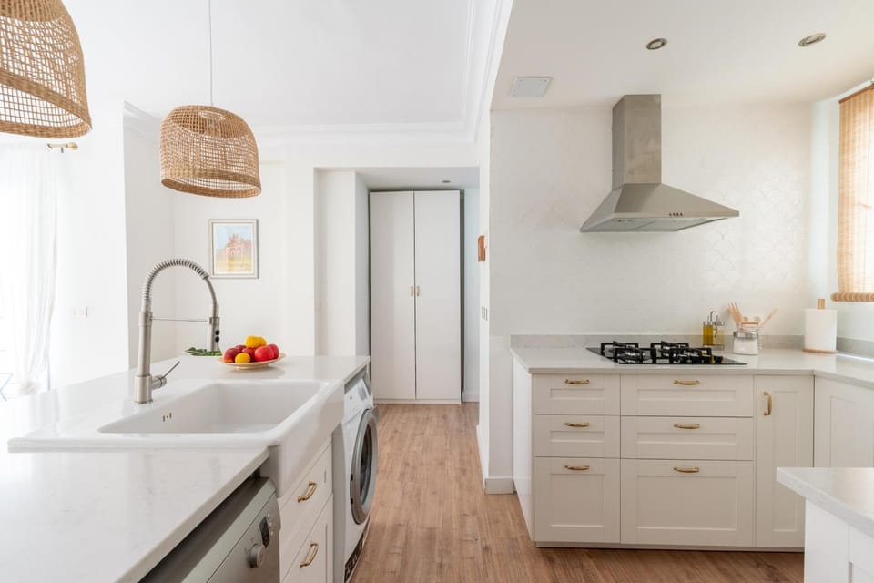 Kitchen or kitchenette, dishwasher, stove, washing machine
