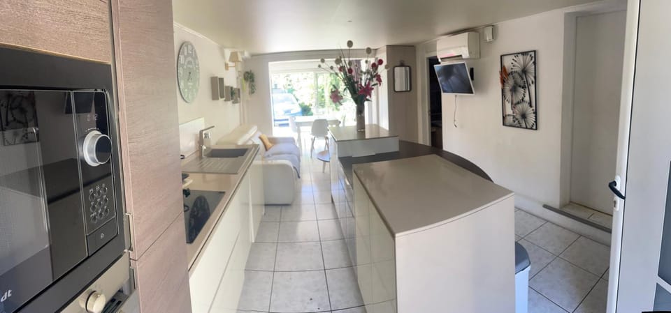 Kitchen or kitchenette, dishwasher, oven, stove
