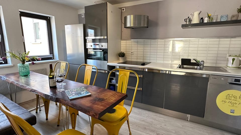 Kitchen or kitchenette, dishwasher, oven, stove, toaster