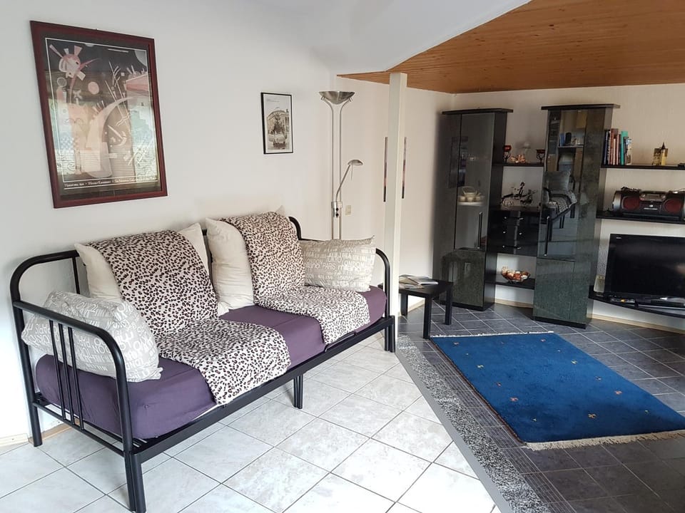 Bed, Living room, Seating area