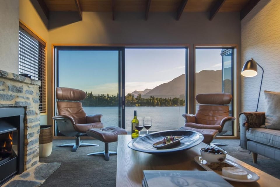 Natural landscape, Living room, Lake view, Mountain view, Sunset, fireplace