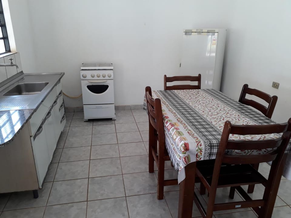 Dining area, minibar, oven, stove