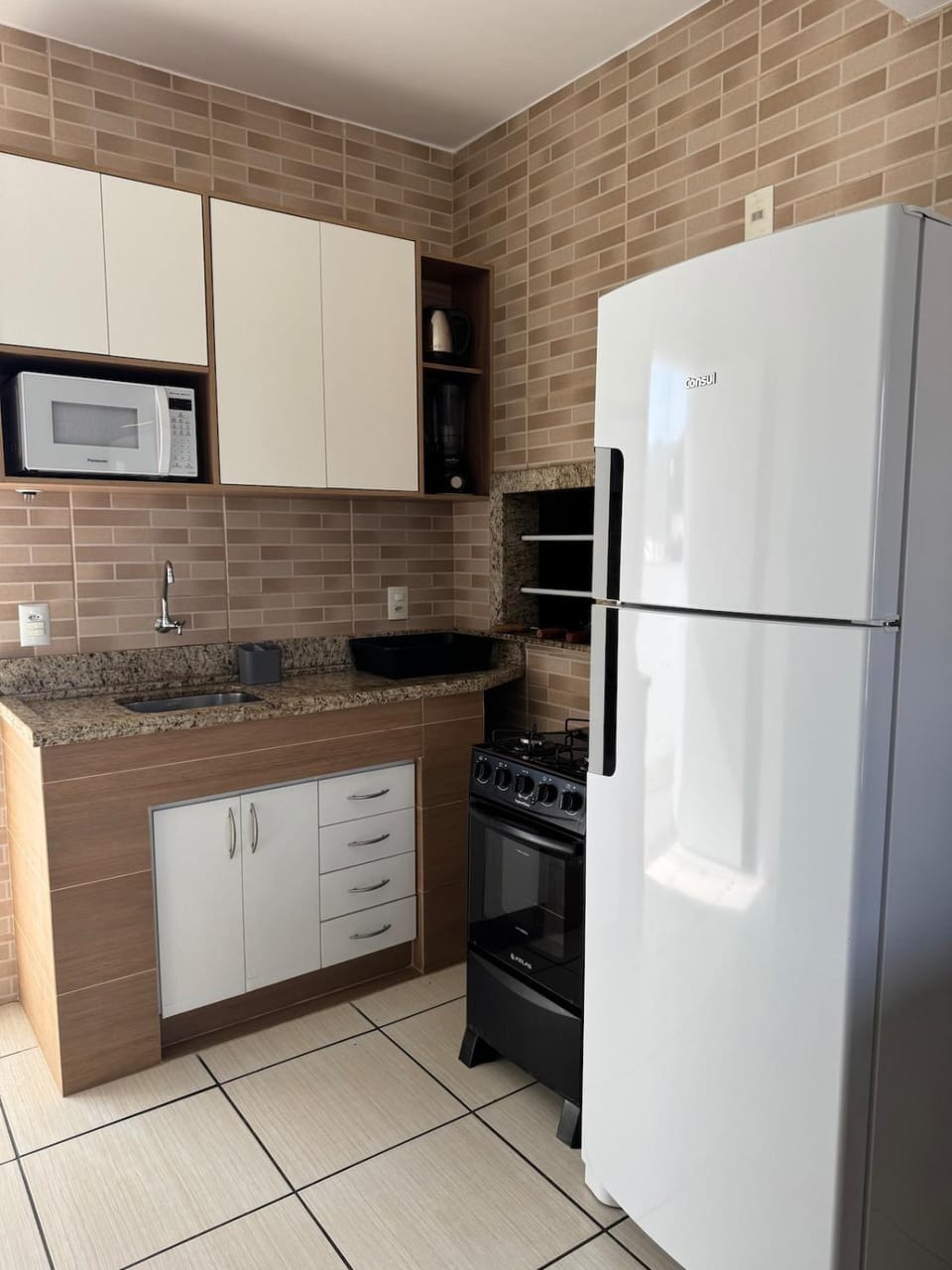Kitchen or kitchenette, oven, stove