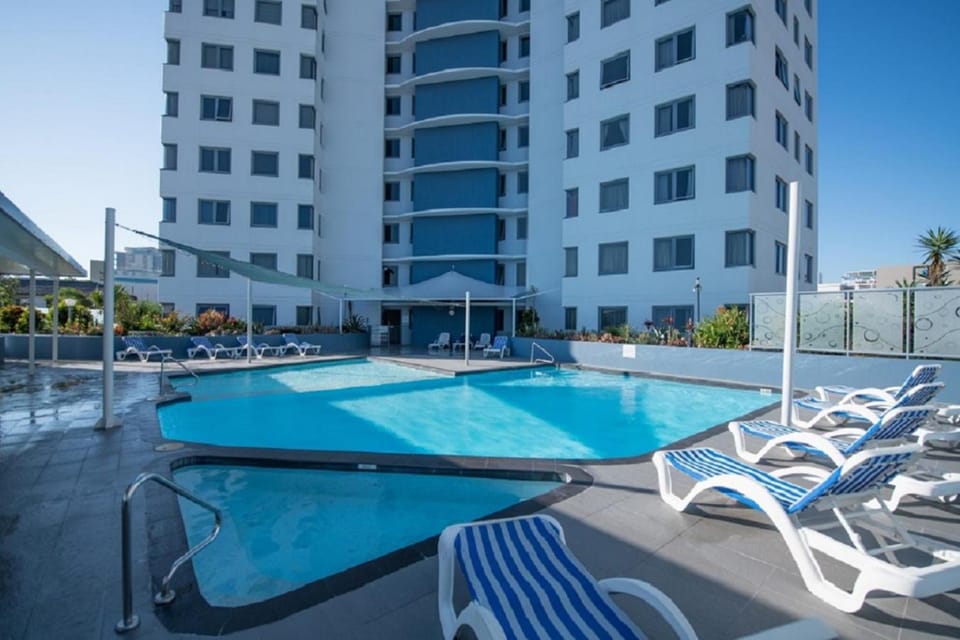 Property building, Patio, Day, Pool view, Swimming pool, Seasons, Sunrise, Sunset, sunbed