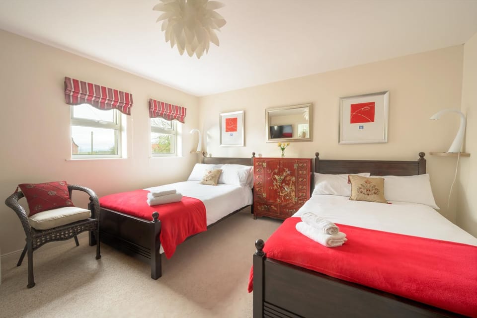 Bed, Seating area, Bedroom, storage, towels, wardrobe