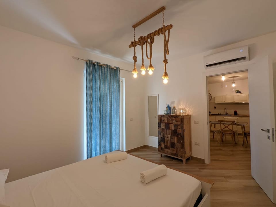 Photo of the whole room, Bedroom, hair dresser, towels, air conditioner