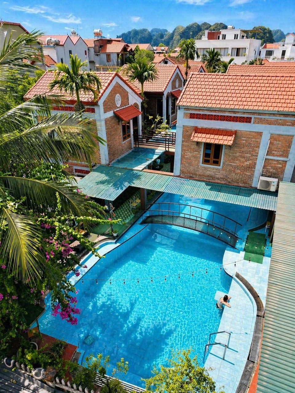 Property building, Day, Natural landscape, Pool view, Swimming pool, sunbed