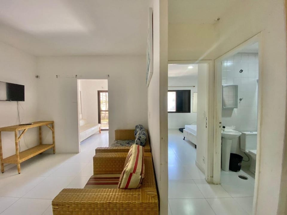 APARTAMENTO Pe na Areia com piscina vista mar bairro nobre Apartment in Bertioga