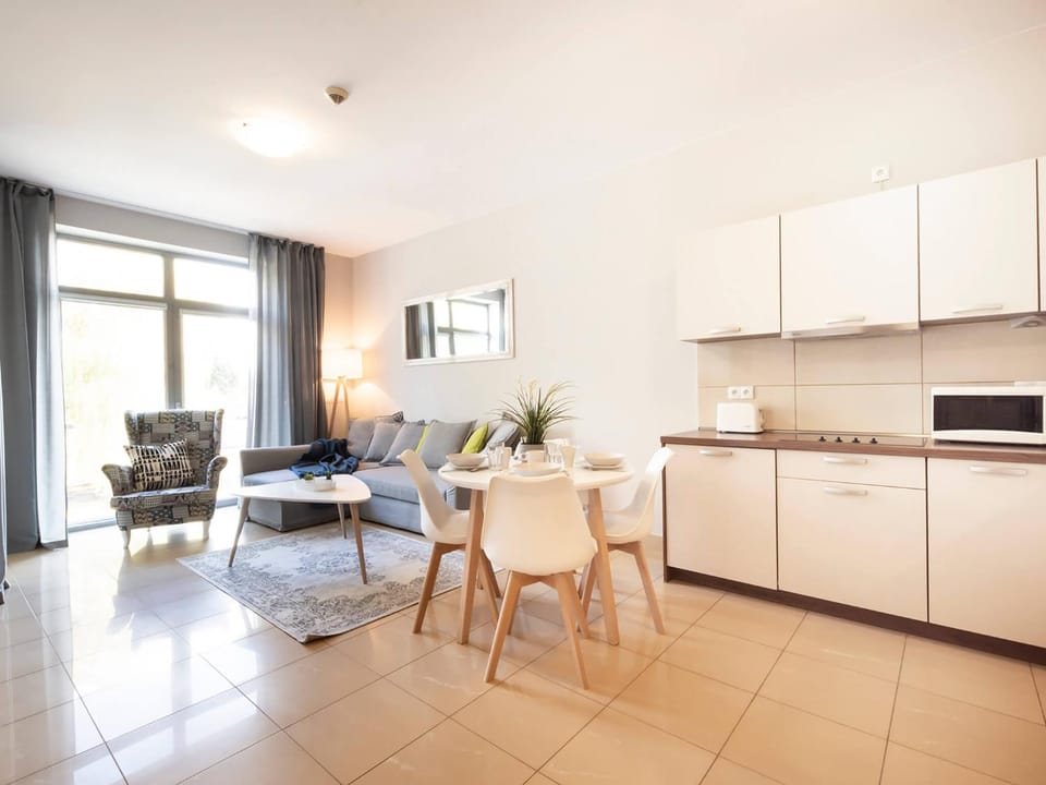 Kitchen or kitchenette, Living room, Seating area, Dining area