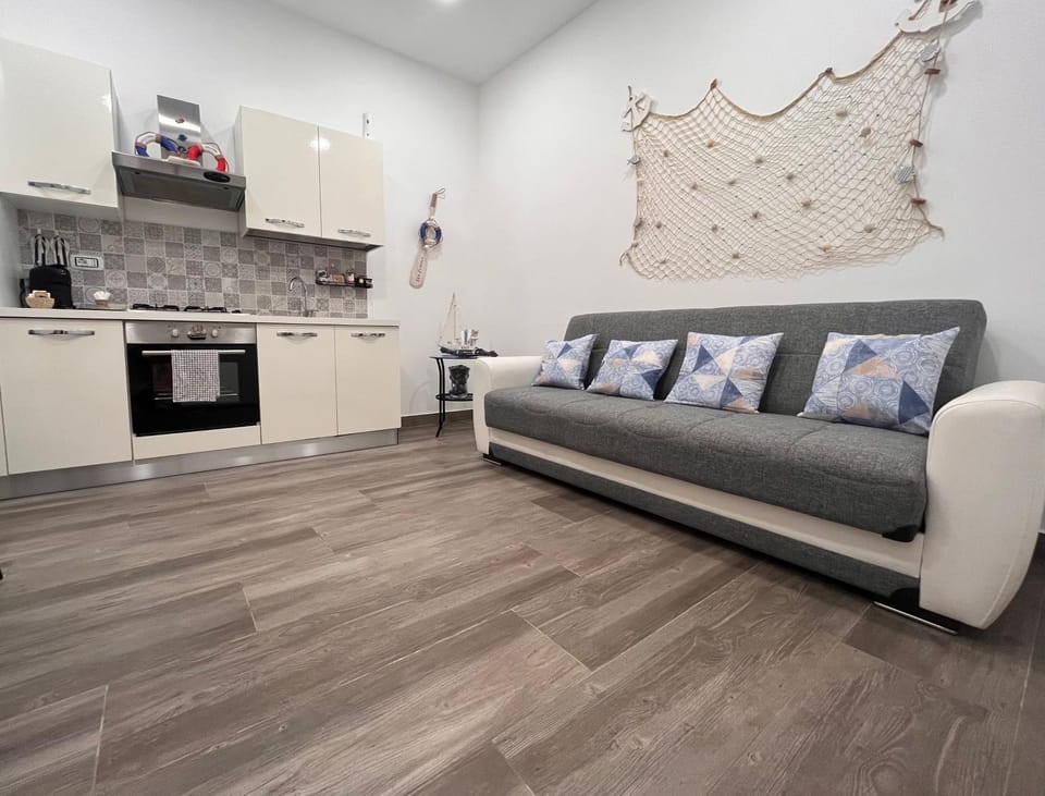 Kitchen or kitchenette, Living room, Seating area, stove