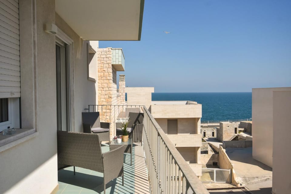Property building, Patio, Day, Natural landscape, View (from property/room), Balcony/Terrace, Living room, Seating area, Sea view