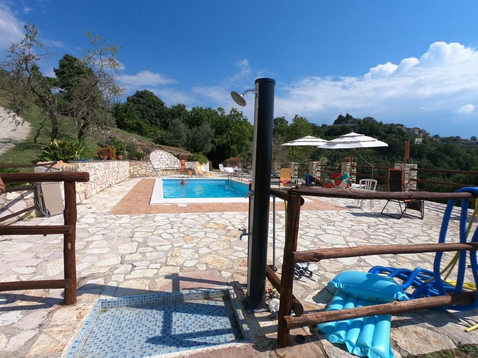 Patio, Natural landscape, Pool view, Swimming pool, sunbed