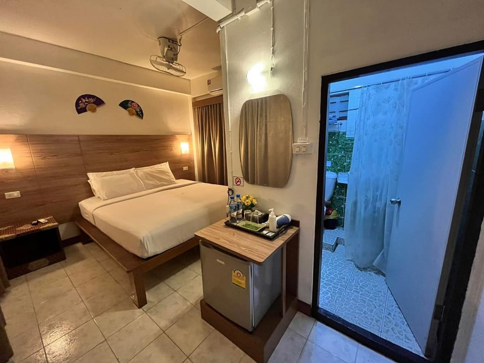 Bed, Photo of the whole room, Bedroom, towels, air conditioner