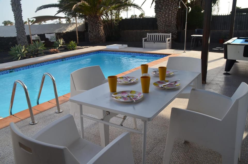 Property building, Living room, Swimming pool