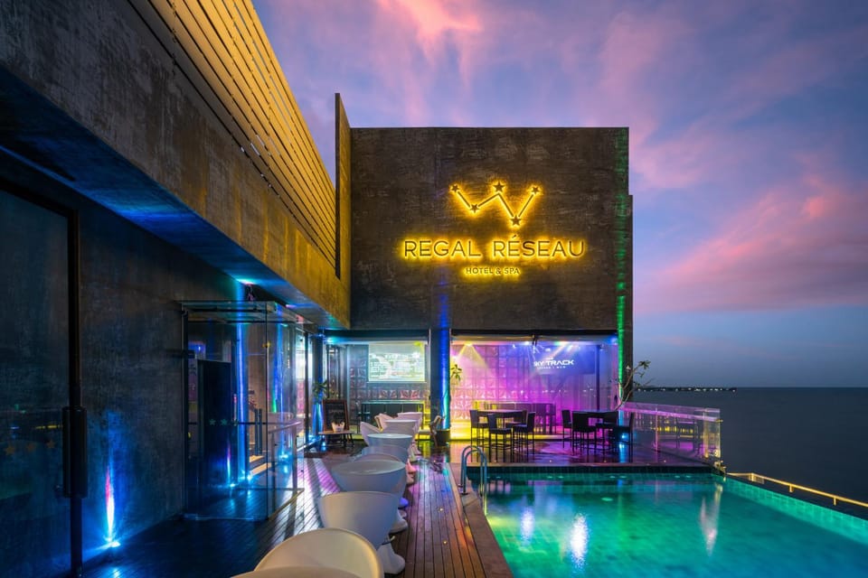 Property building, Property logo or sign, Swimming pool, Sunrise, Sunset