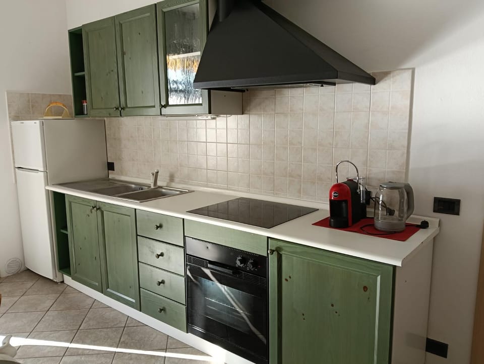 Kitchen or kitchenette, stove