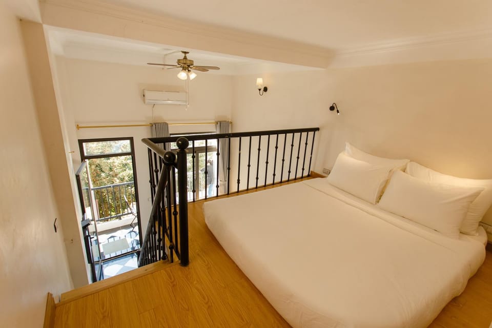 Communal lounge/ TV room, Bed, Bed, Day, People, Garden, Garden, Balcony/Terrace, Balcony/Terrace, Living room, Other, Photo of the whole room, Decorative detail, Decorative detail, Seating area, Bedroom, Bedroom, On site, Garden view, Mountain view, Mountain view, Area and facilities, Time of day, Sunrise, bunk bed, Family, Family