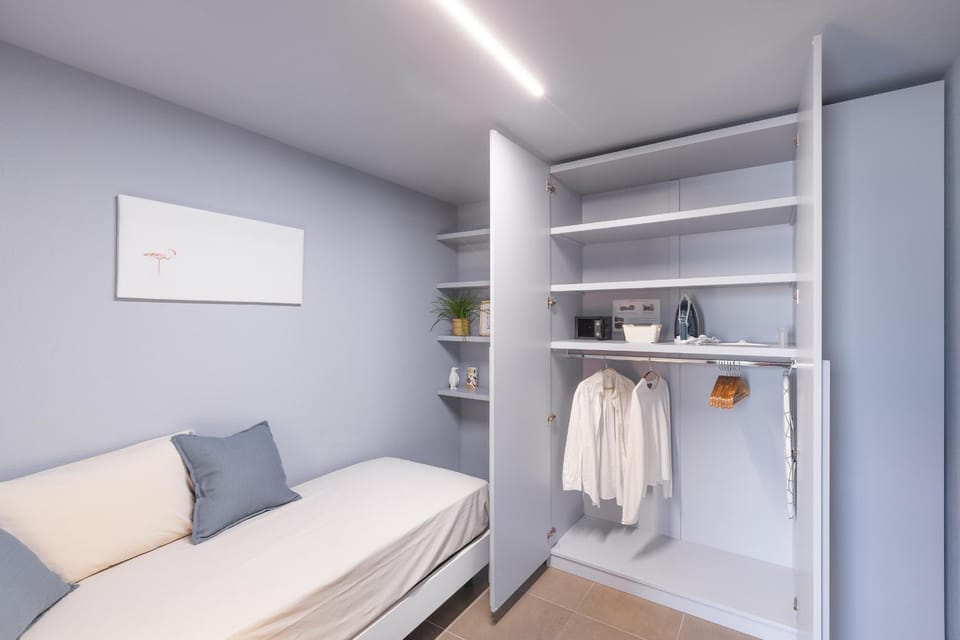 Bed, wardrobe