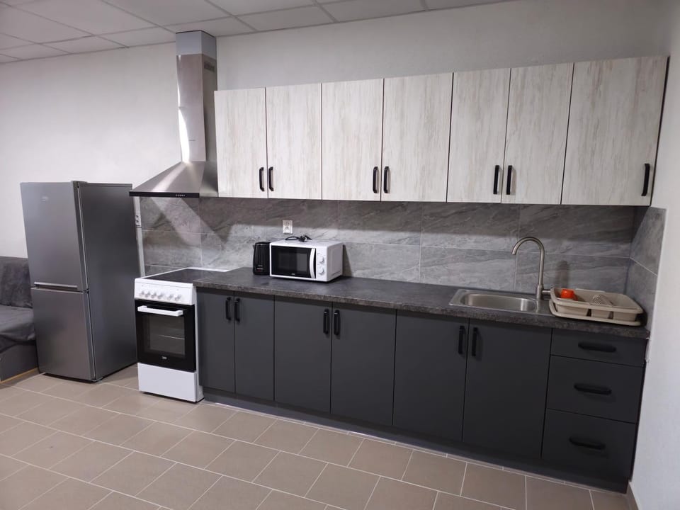 Kitchen or kitchenette, oven, stove, toaster