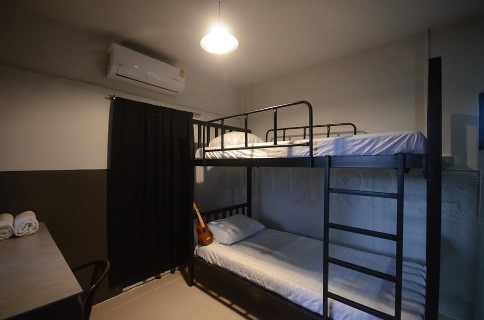 Photo of the whole room, Bedroom, bunk bed, towels, air conditioner