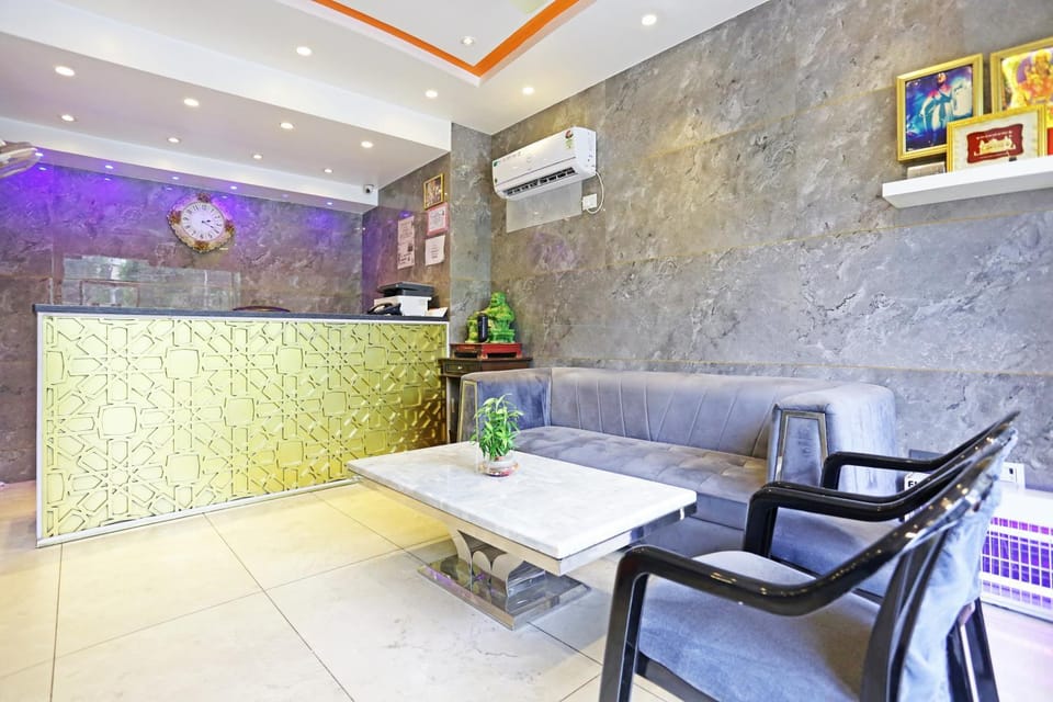 Property building, Living room, Seating area, air conditioner